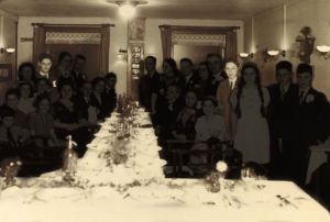 Photo of a family gathering in 1939, showing the only two survivors